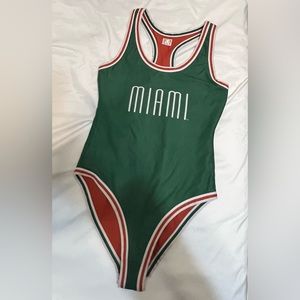 reversible miami hurricanes bodysuit.